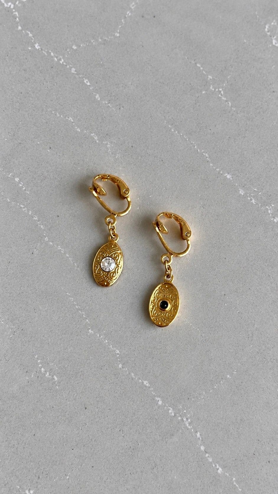Ornamental gold tone earrings 2