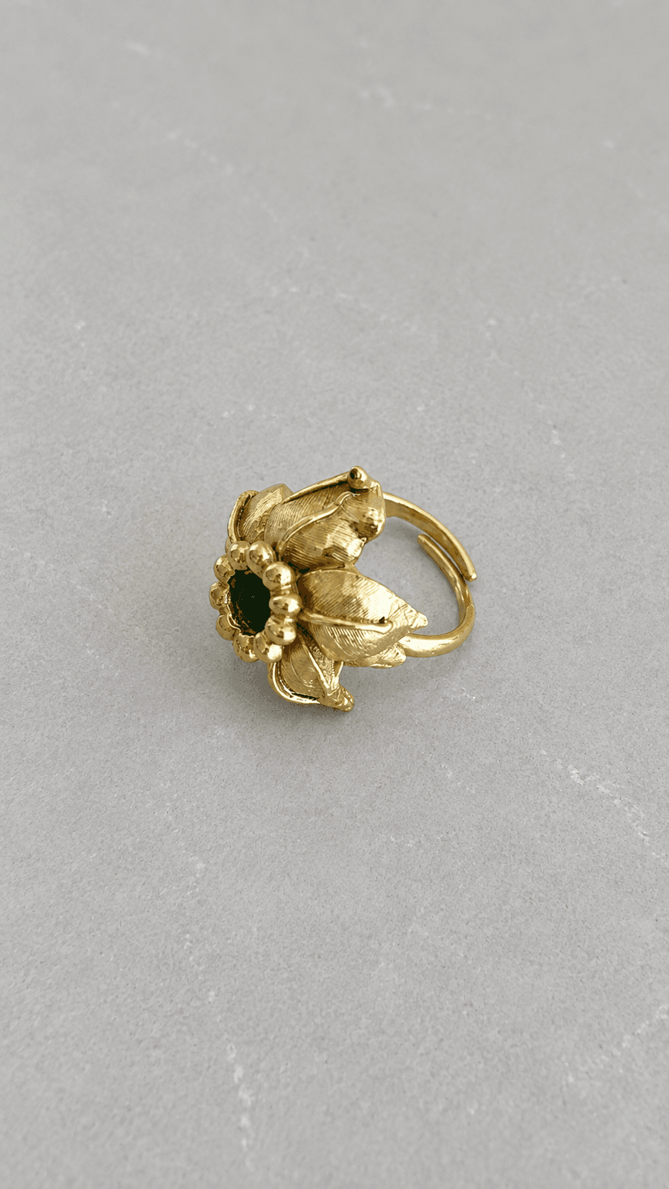 Green gold tone floral ring
