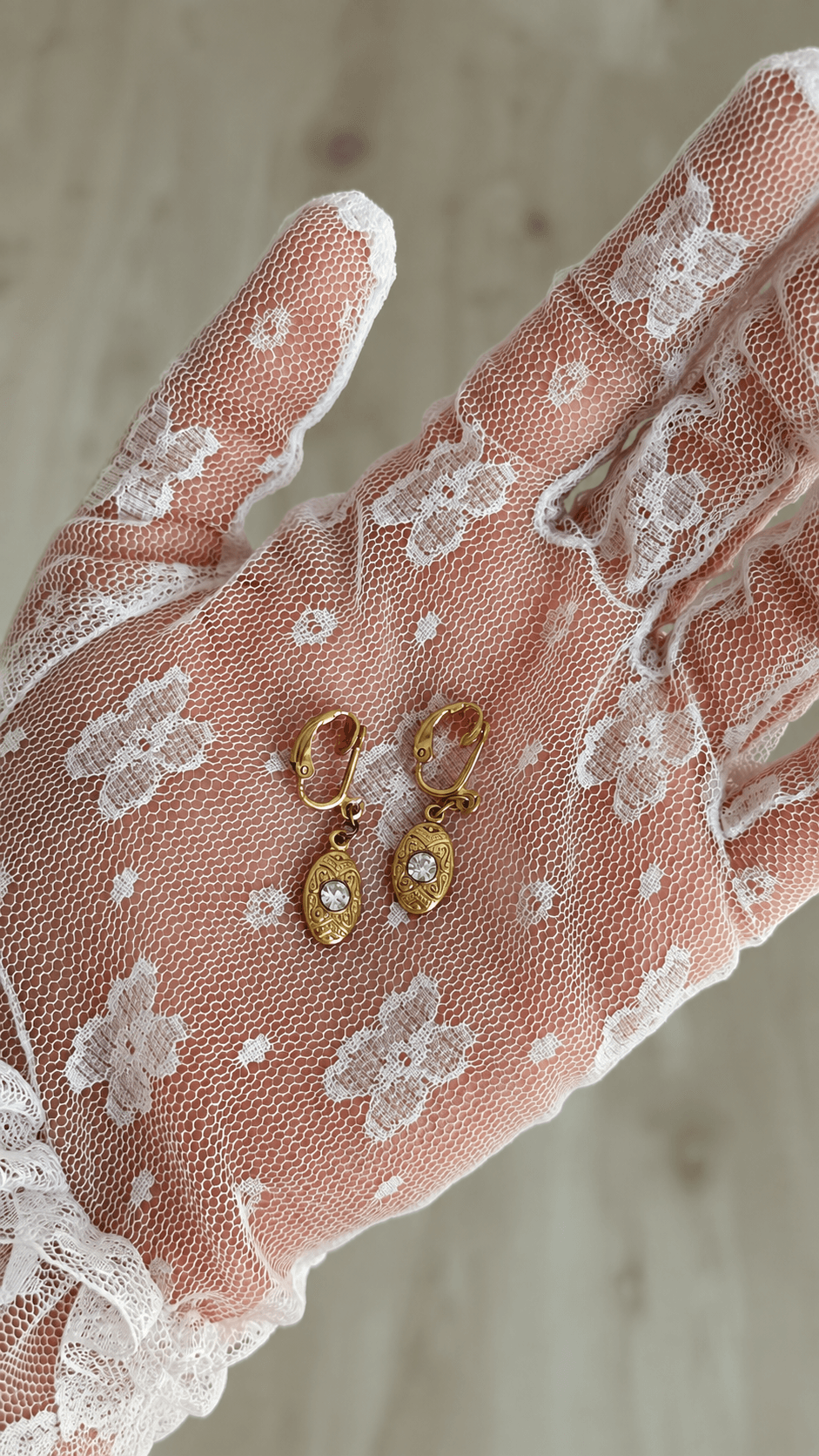 Ornamental gold tone earrings 3